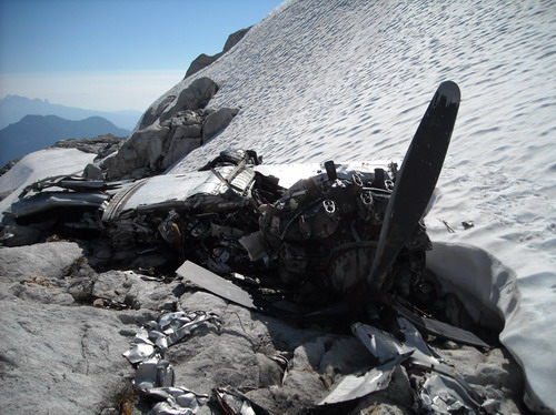 Ridge Meadows police investigate plane crash scene from 1953