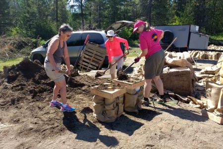 Shovels instead of paddles: Dragon Boat Team fills sandbags