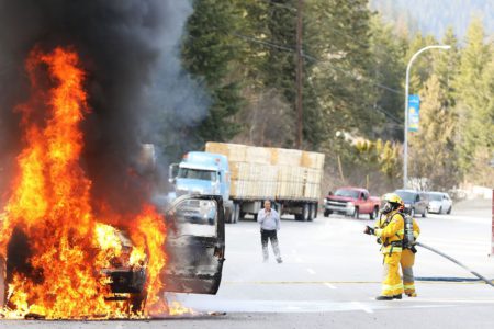 Massive vehicle fire closes Hwy 3